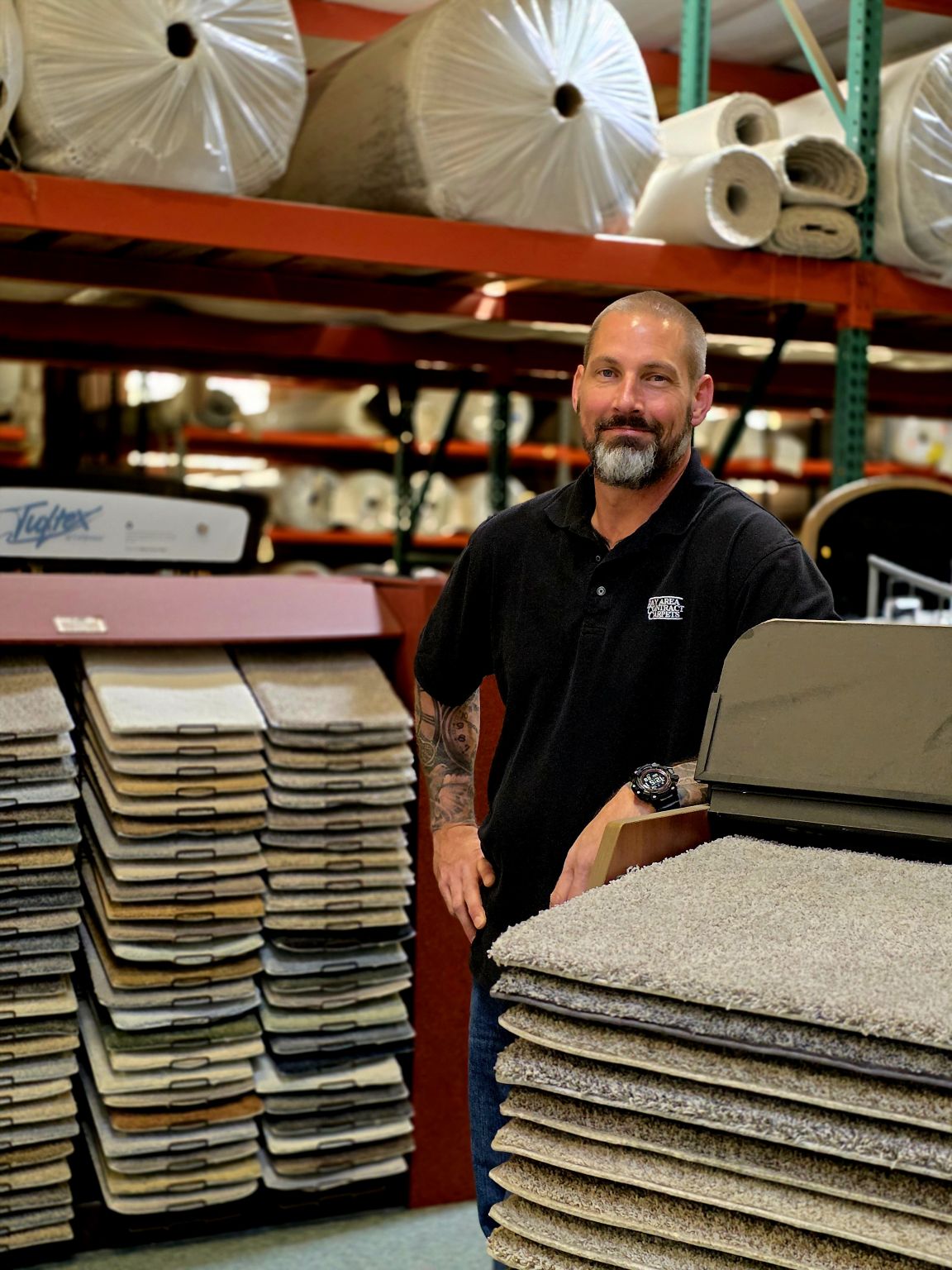Kevin Scott, owner of Bay Area Contract Carpets, in the Oakland warehouse