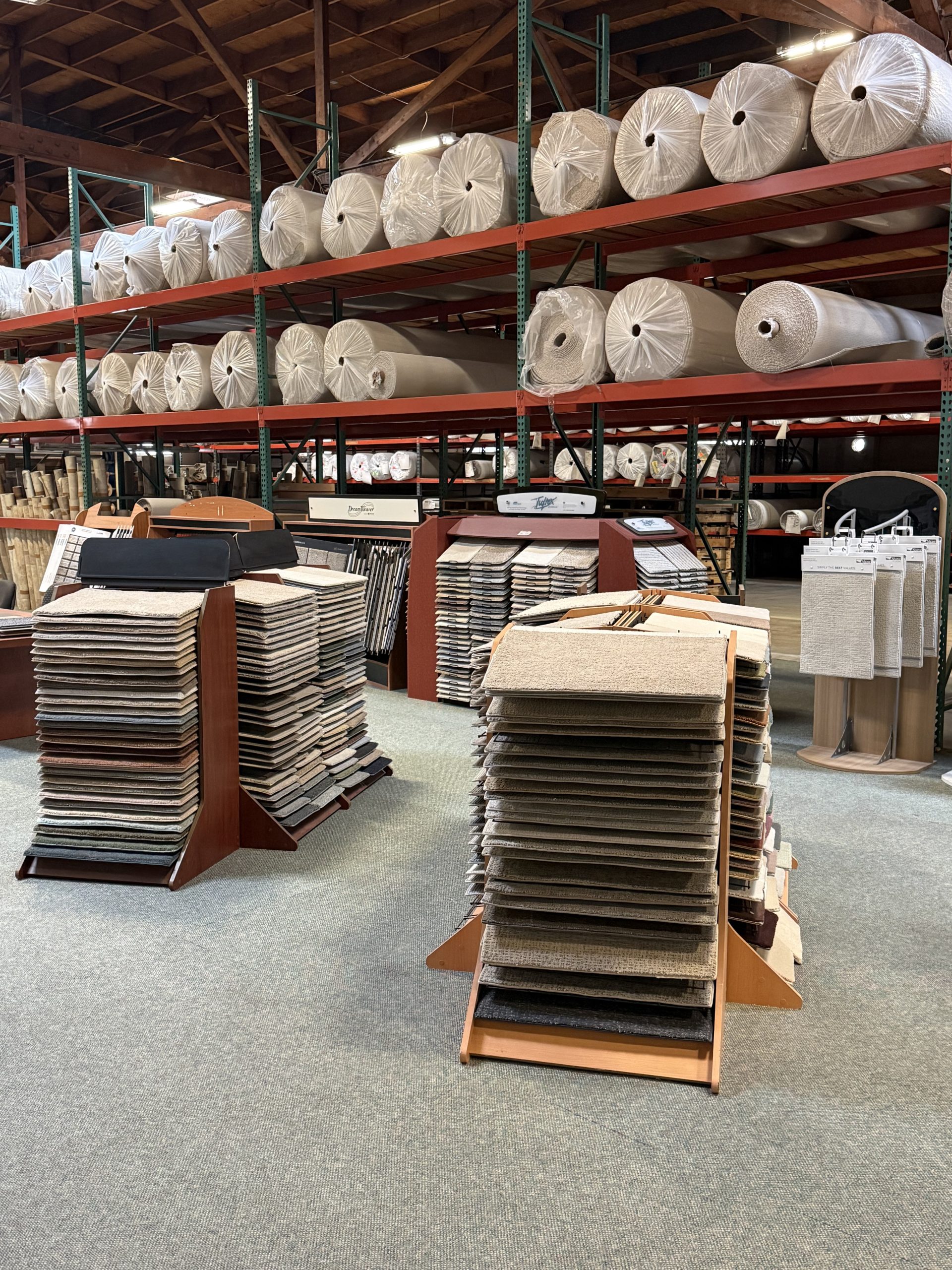 Carpet rolls and showroom sample displays at Bay Area Contract Carpets in Oakland